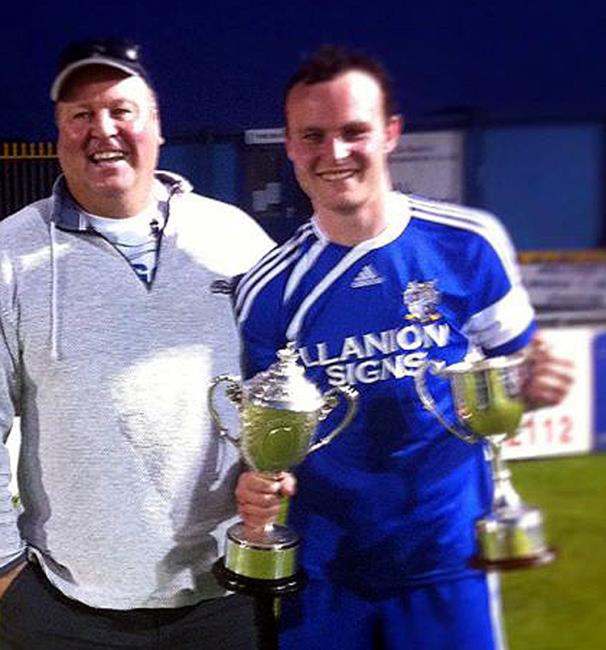 Proud moment - Steve Callan with his son Jamie showing off the silverware